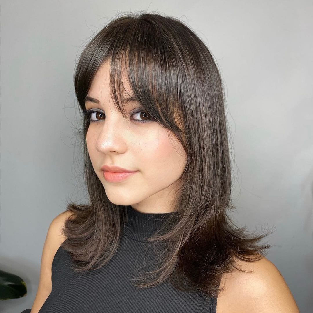 franja longa para rosto redondo