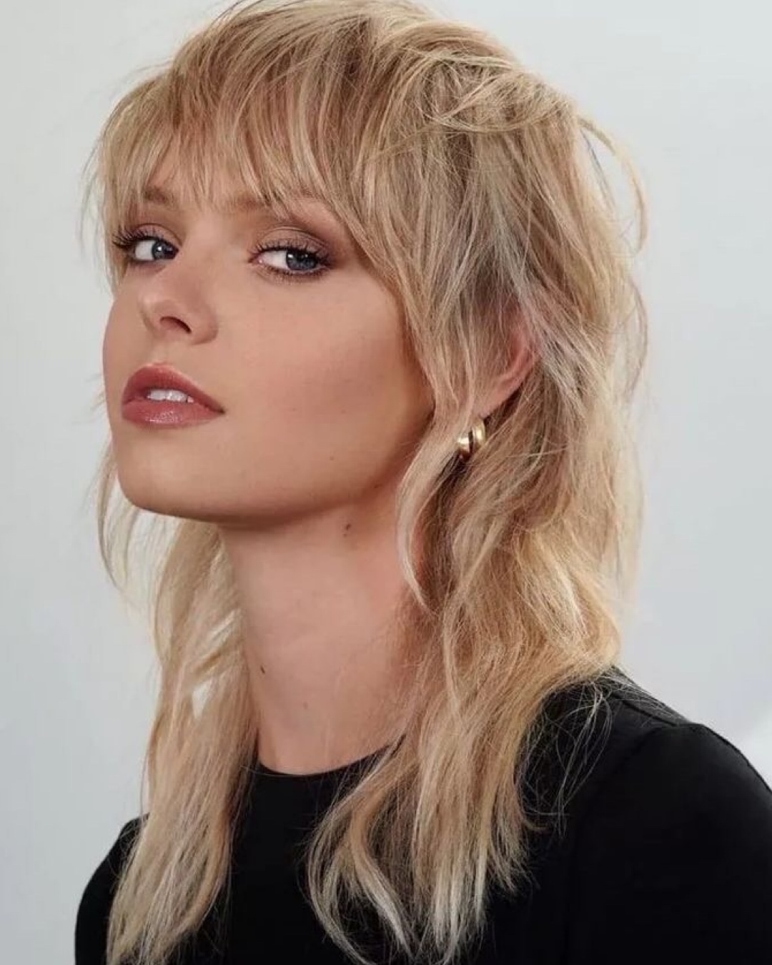 Mullet cacheado