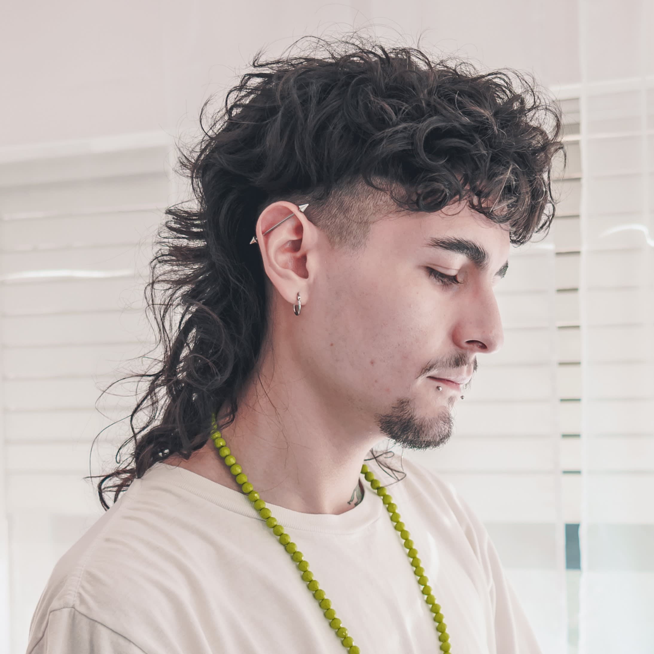 Mullet cacheado